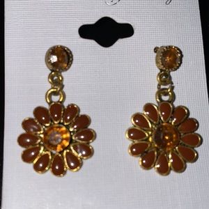Brown floral earrings.